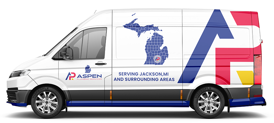 A commercial van with "Aspen Plumbing Services" branding, indicating it serves Jackson, MI, and surrounding areas for water services.