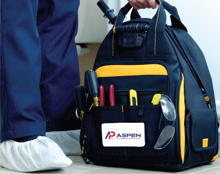 A professional with a tool bag prepared for maintenance work.
