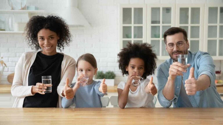 a family drinking clean water