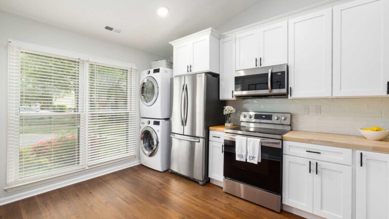 a line of appliances in a kitchen