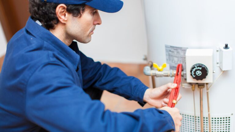 plumber working on a water heater