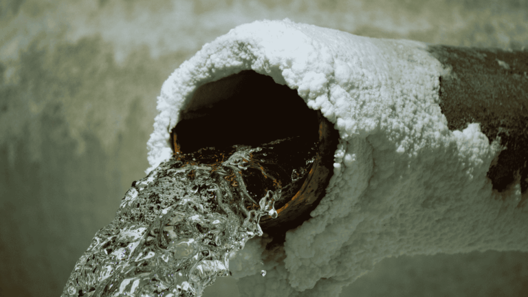 Close-up frozen water pipe